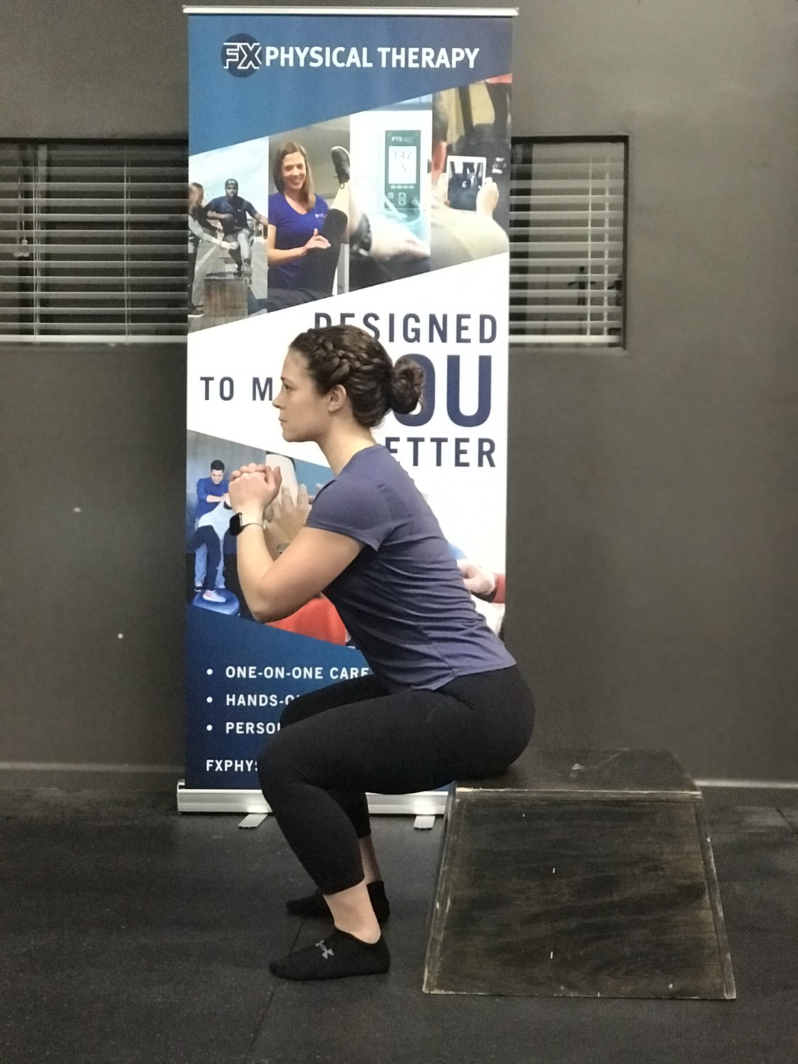 woman doing squat for strength training